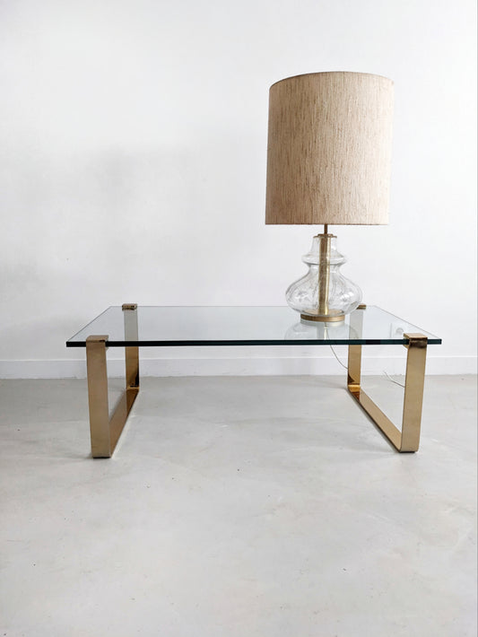 Klassik 1022 coffee table by Peter Draenert for Ronald Schmitt 1960.  Vintage German Midcentury Modern design. Brass or gold coloured base with a thick glass top.
