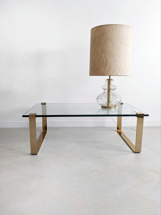 Klassik 1022 coffee table by Peter Draenert for Ronald Schmitt 1960.  Vintage German Midcentury Modern design. Brass or gold coloured base with a thick glass top.  