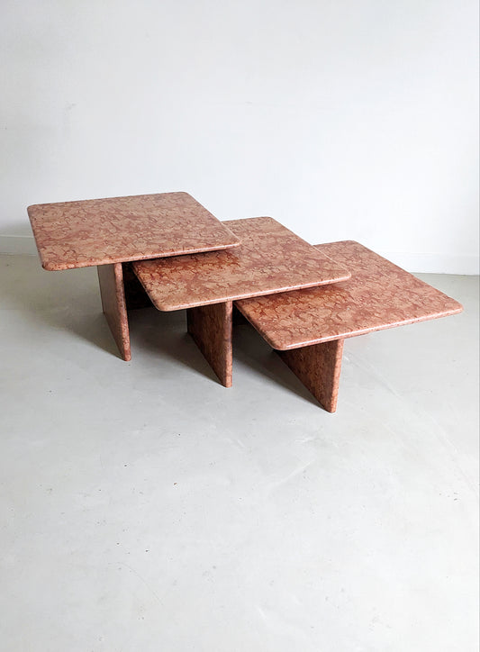 Antico Rosso Marble stone nesting tables. Vintage design from the 1970's. This set of three tables slides into each other and can be used together or seperatly as a coffee table or side table. 